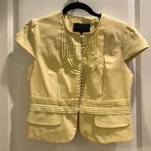 BCBG yellow button up cap sleeve jacket